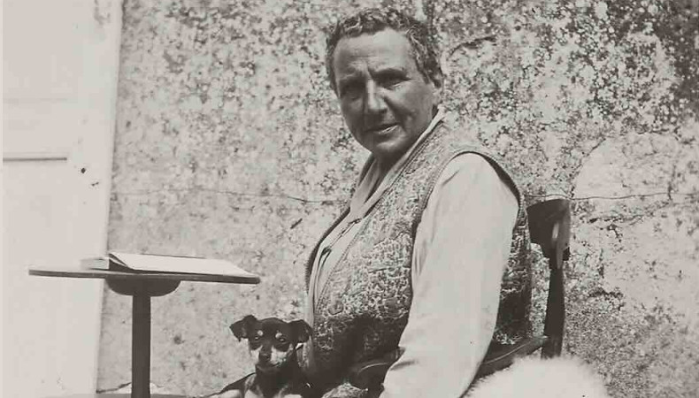 Gertrude Stein at Bilignin, France, with her dogs Pépé and Basket, ca. 1933